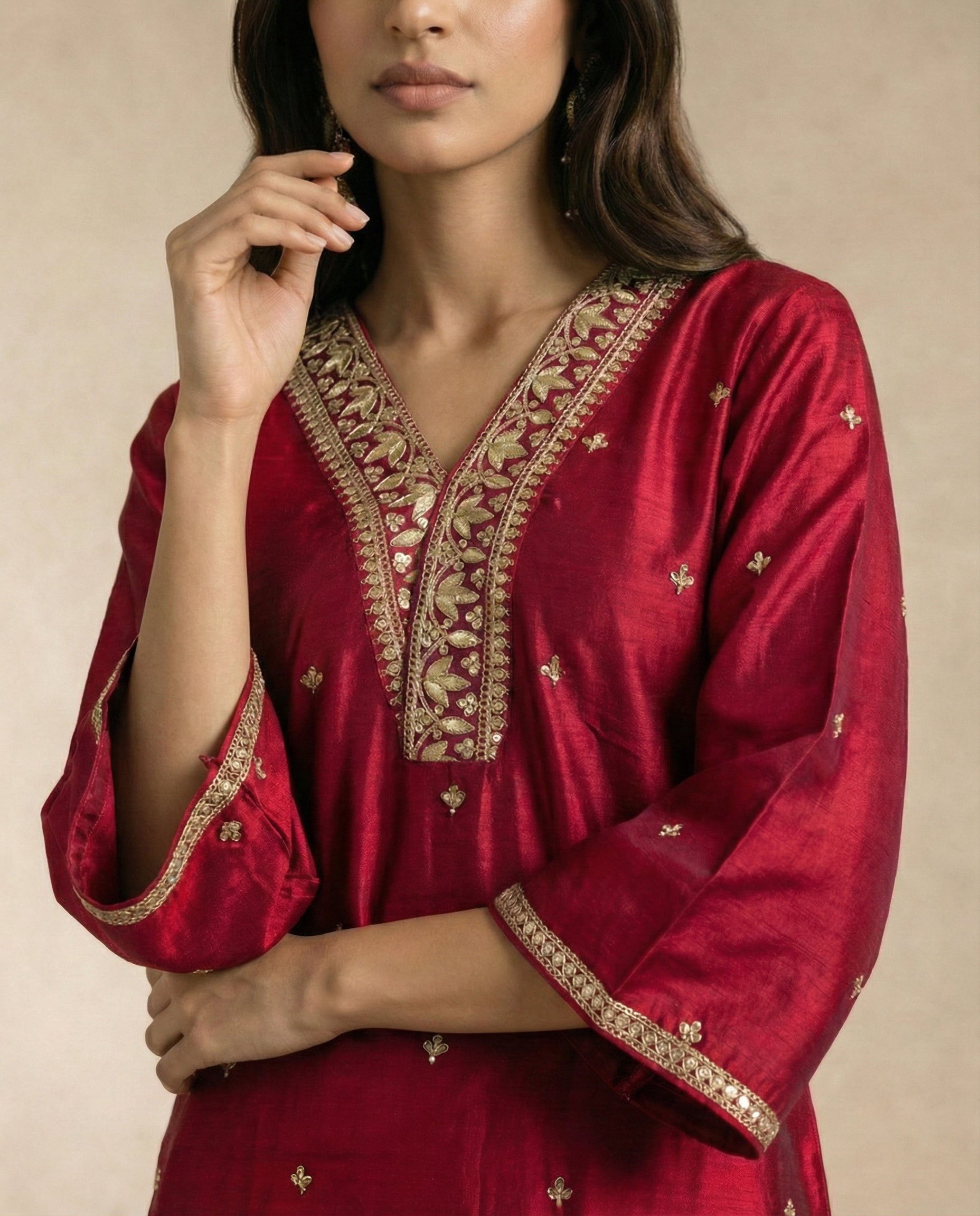 FARHEEN crimson kurta salwar set with sequin-striped dupatta by Neha Sharma Label.