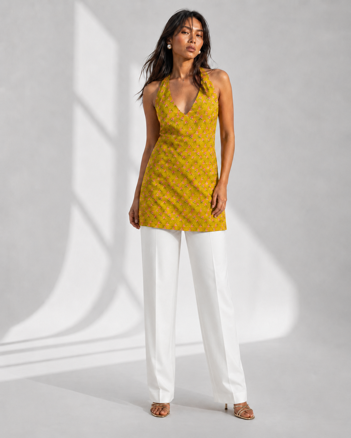 LIVARA mustard floral buti print halter kurti by Neha Sharma Label