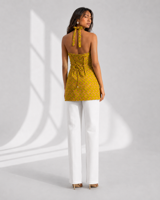 LIVARA mustard floral halter kurti with fabric neck tie by Neha Sharma Label