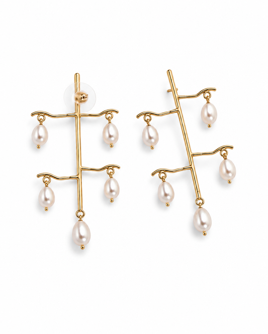 JHEEL earrings shown at an angle, five teardrop pearls hanging from each branched stem
