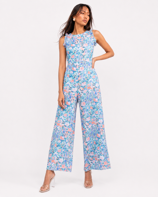 FLEUR floral jumpsuit showing the fitted waist and wide legs.
