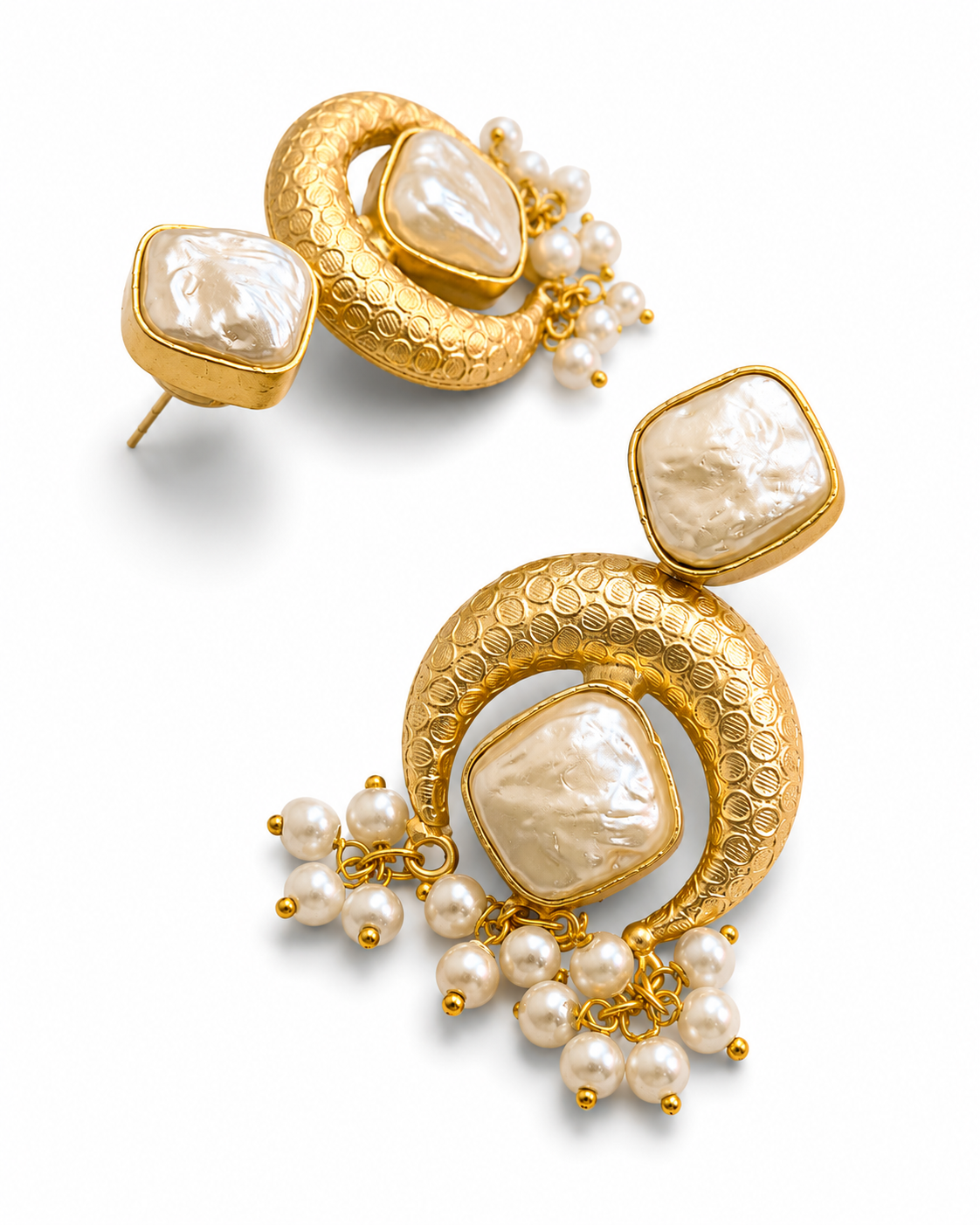 NADIYA gold-tone baroque pearl crescent drop earrings by Neha Sharma Label, angled pair showing the post