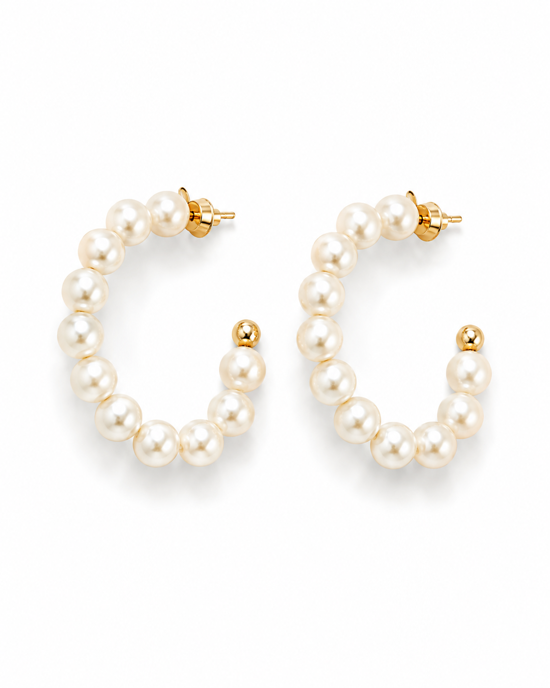 LORELEI pearl beaded hoops shown at an angle with the gold bead terminal and push back visible