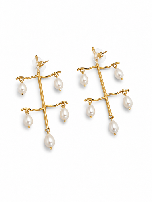 Angled view of JHEEL earrings showing the branched stem and the push-back posts