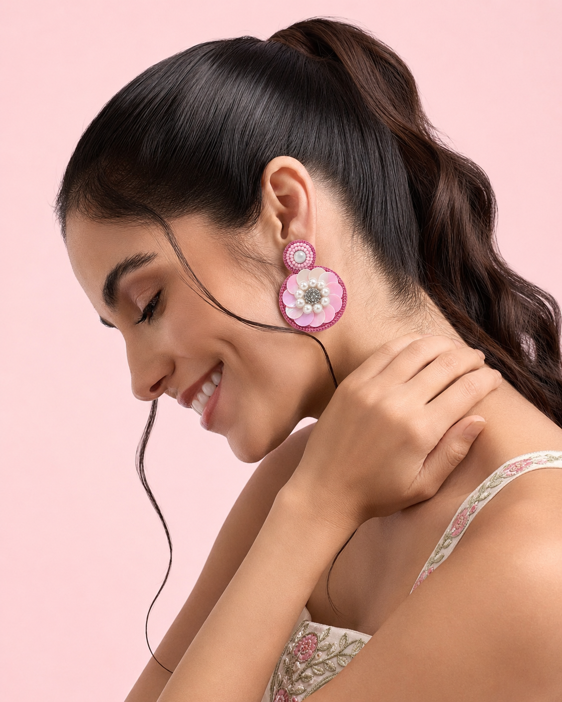 Neha Sharma Label Pink Bonbon sequin flower drop earrings with pearl-finish ring and rose cord frame.