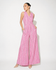 Model wearing DAHLIA pink stripe print cotton jumpsuit by Neha Sharma Label.