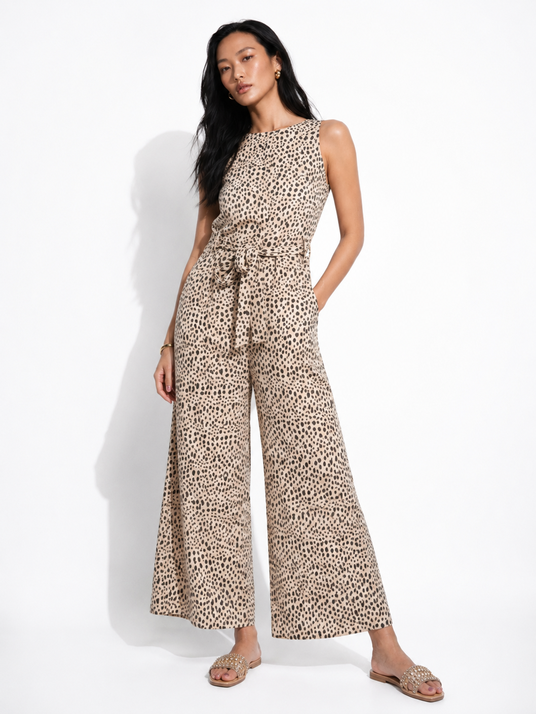 Model wearing HAZEL cheetah print wide-leg jumpsuit by Neha Sharma Label.