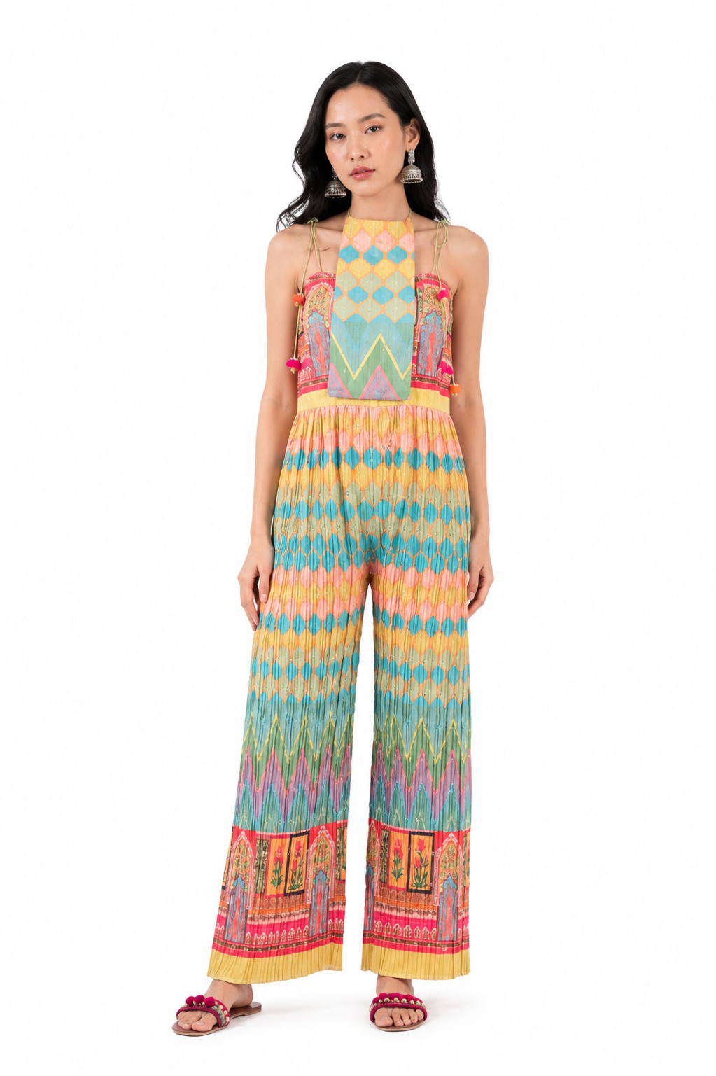 LUCIA jumpsuit showing the lattice, chevron and palace-border print in full.