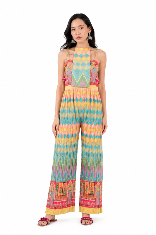 LUCIA jumpsuit showing the lattice, chevron and palace-border print in full.