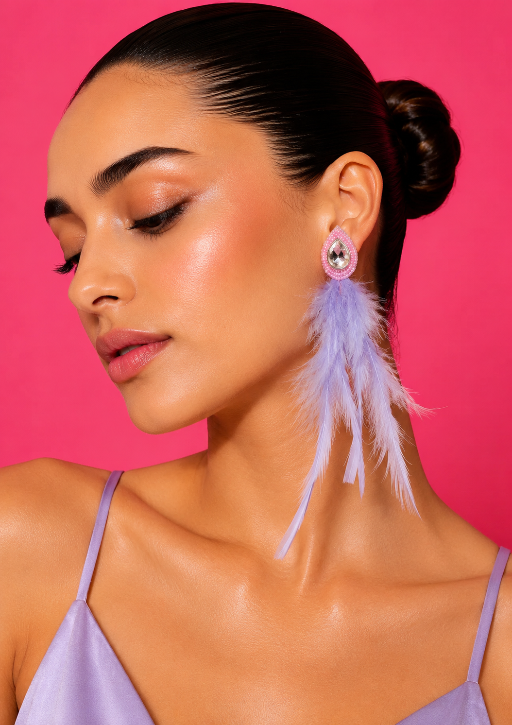 Neha Sharma Label Lavender Twist feather earrings with pink beaded teardrop and clear stone.