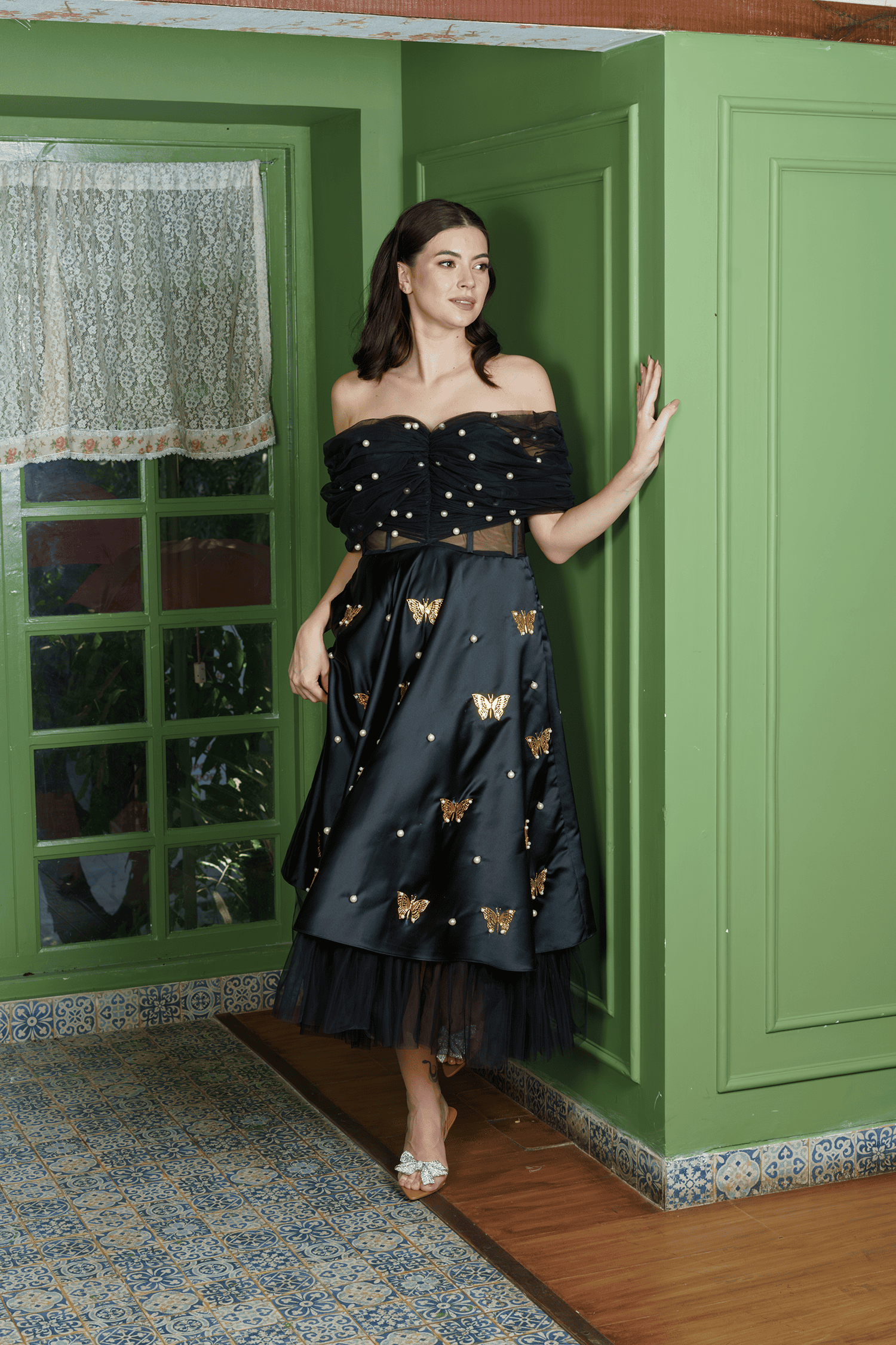 Midnight Siren black dress, full-length view with flared satin skirt and layered tulle hem