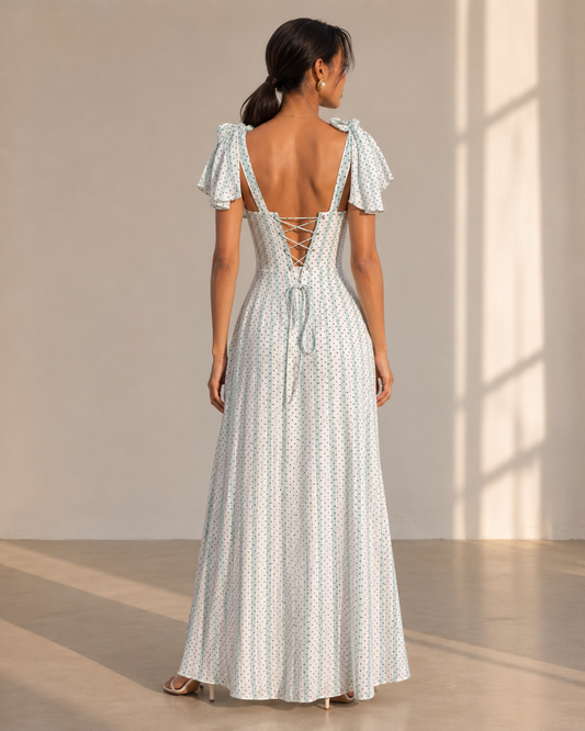Back view of the SYLVIE white striped maxi dress showing the lace-up corset back.