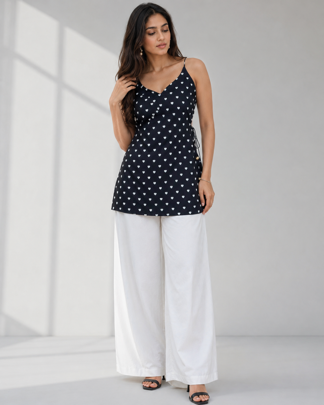 NAZAARA black heart print cotton kurti with open tie-up back and pearl-tipped ties by Neha Sharma Label