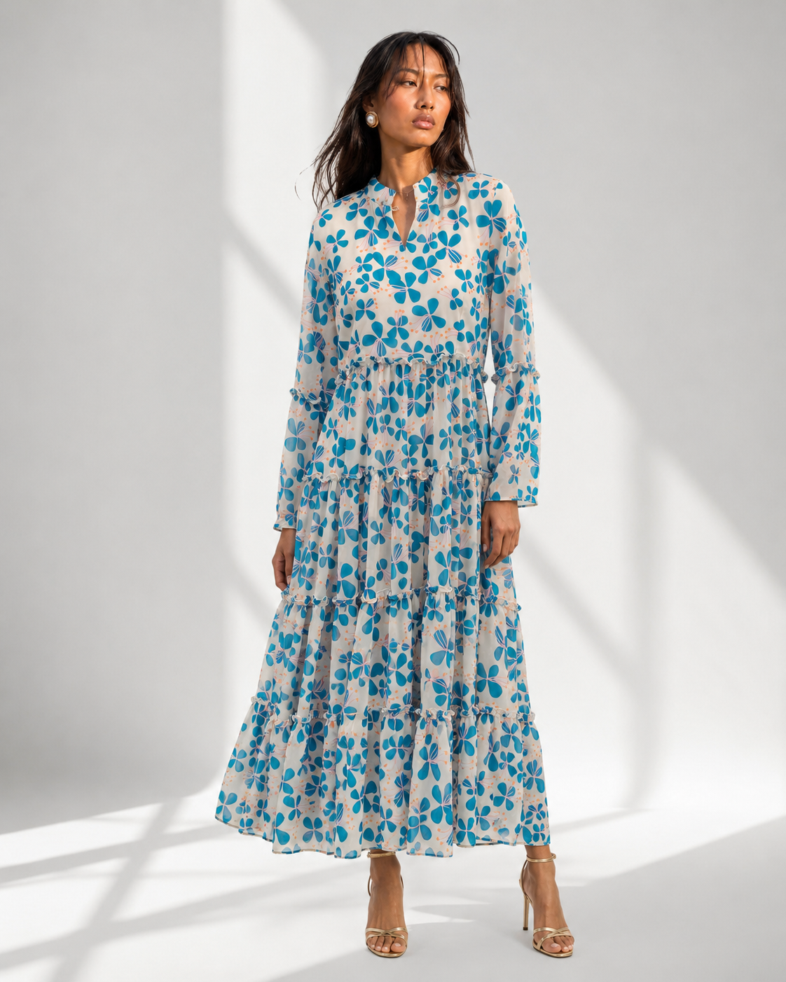 MIRELLE blue petal print tiered maxi dress with mandarin collar by Neha Sharma Label