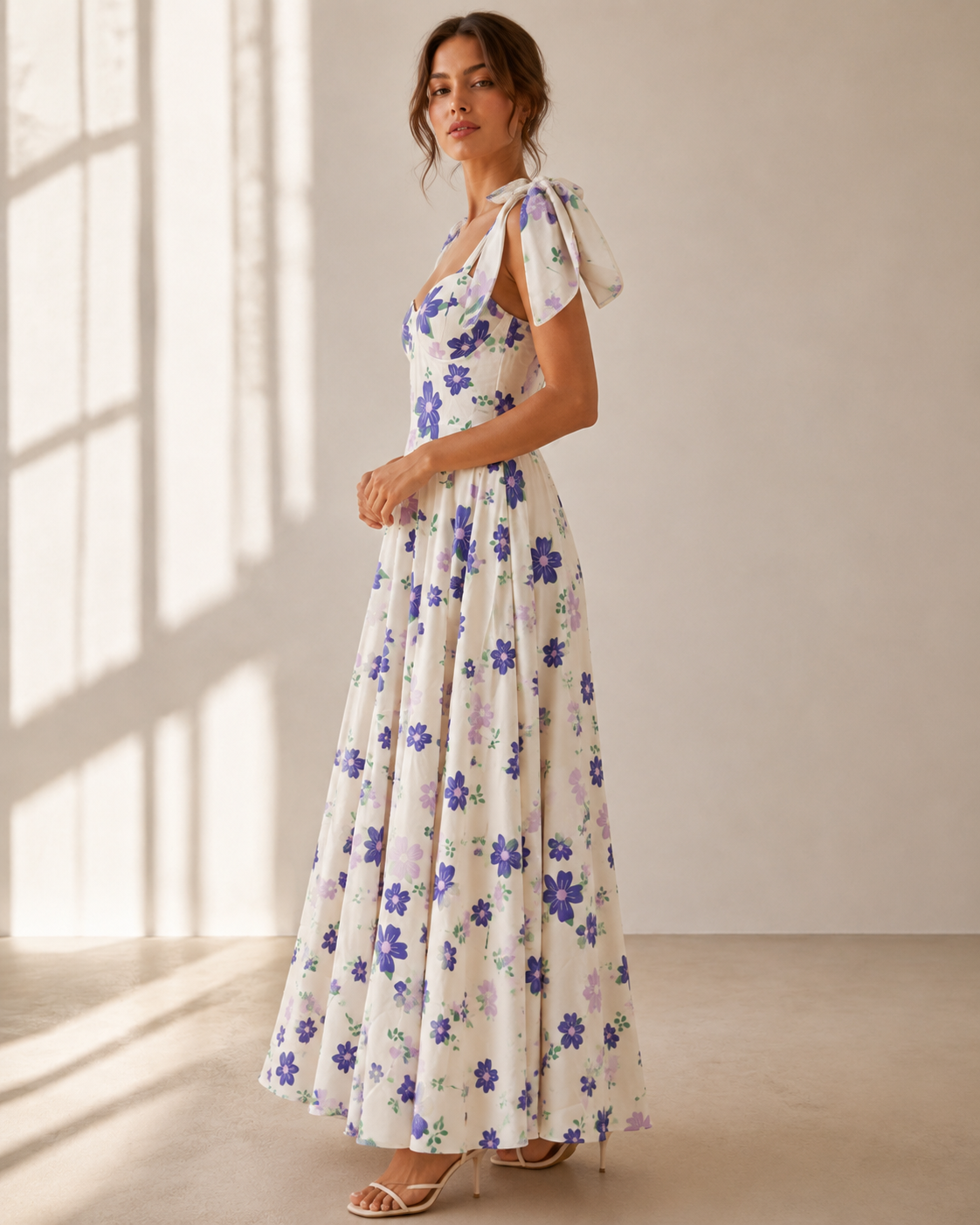 DELPHINE white maxi dress with violet and lilac floral print and corset-seamed sweetheart bodice.