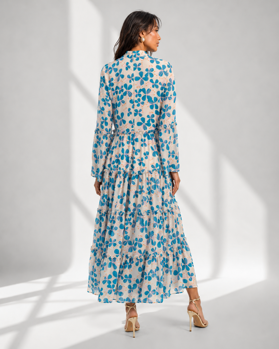 MIRELLE blue petal print maxi dress with frill-edged tiers by Neha Sharma Label
