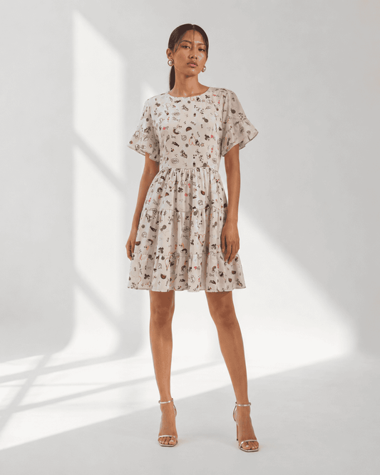 ELORA ivory doodle print tiered mini dress with flutter sleeves by Neha Sharma Label