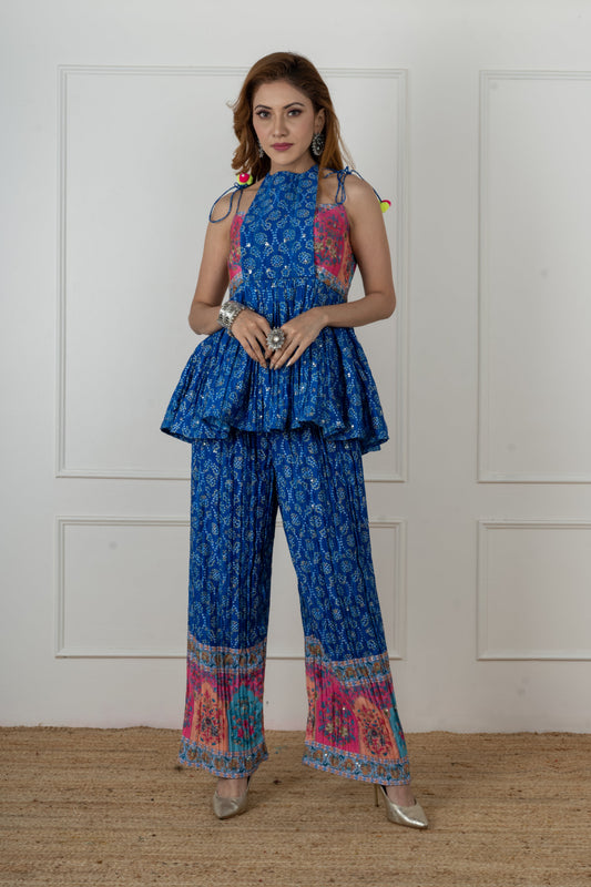 Sahira royal blue bandhani flap kurta set with floral bodice panels, front view.