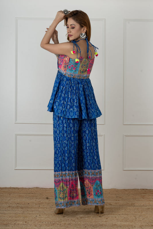 Back view of Sahira royal blue bandhani flap kurta with doori ties and scoop back.
