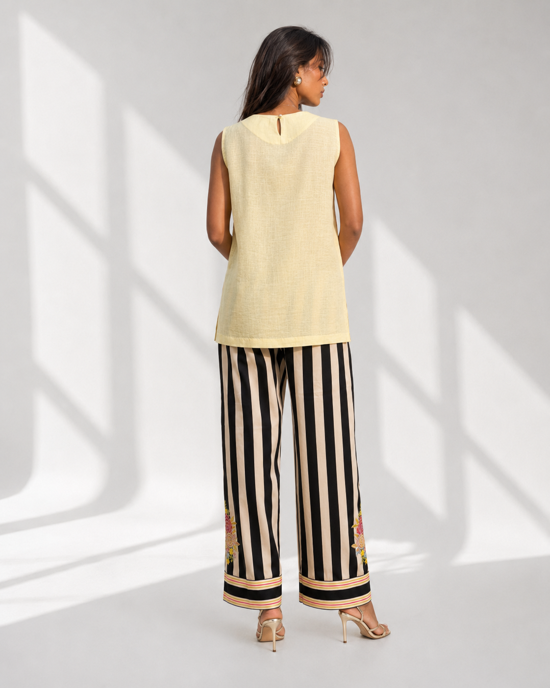 MONARA lemon kurta with machine embroidered floral clusters and ric-rac border by Neha Sharma Label