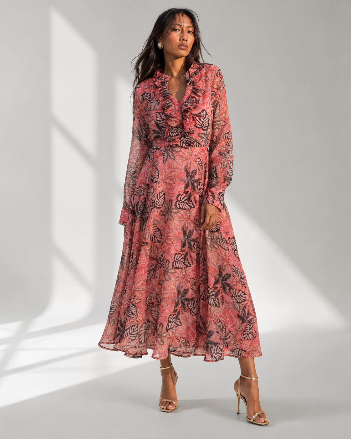 CORALIA coral leaf print ruffle maxi dress by Neha Sharma Label