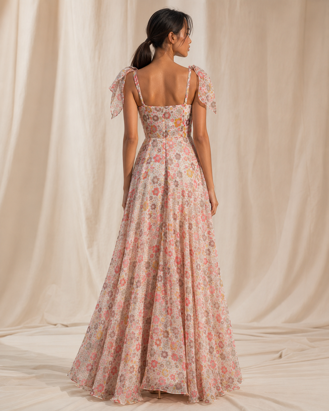 Back view of the PALOMA ivory retro floral gown showing the centre-back zip and full skirt.
