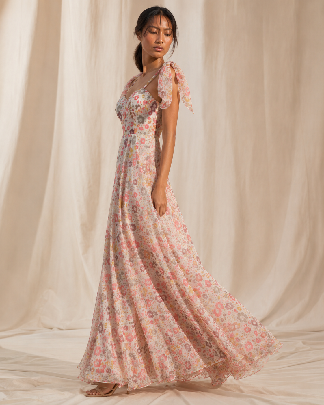PALOMA floor-length ivory floral maxi with sheer overlay and tie-shoulder bows.