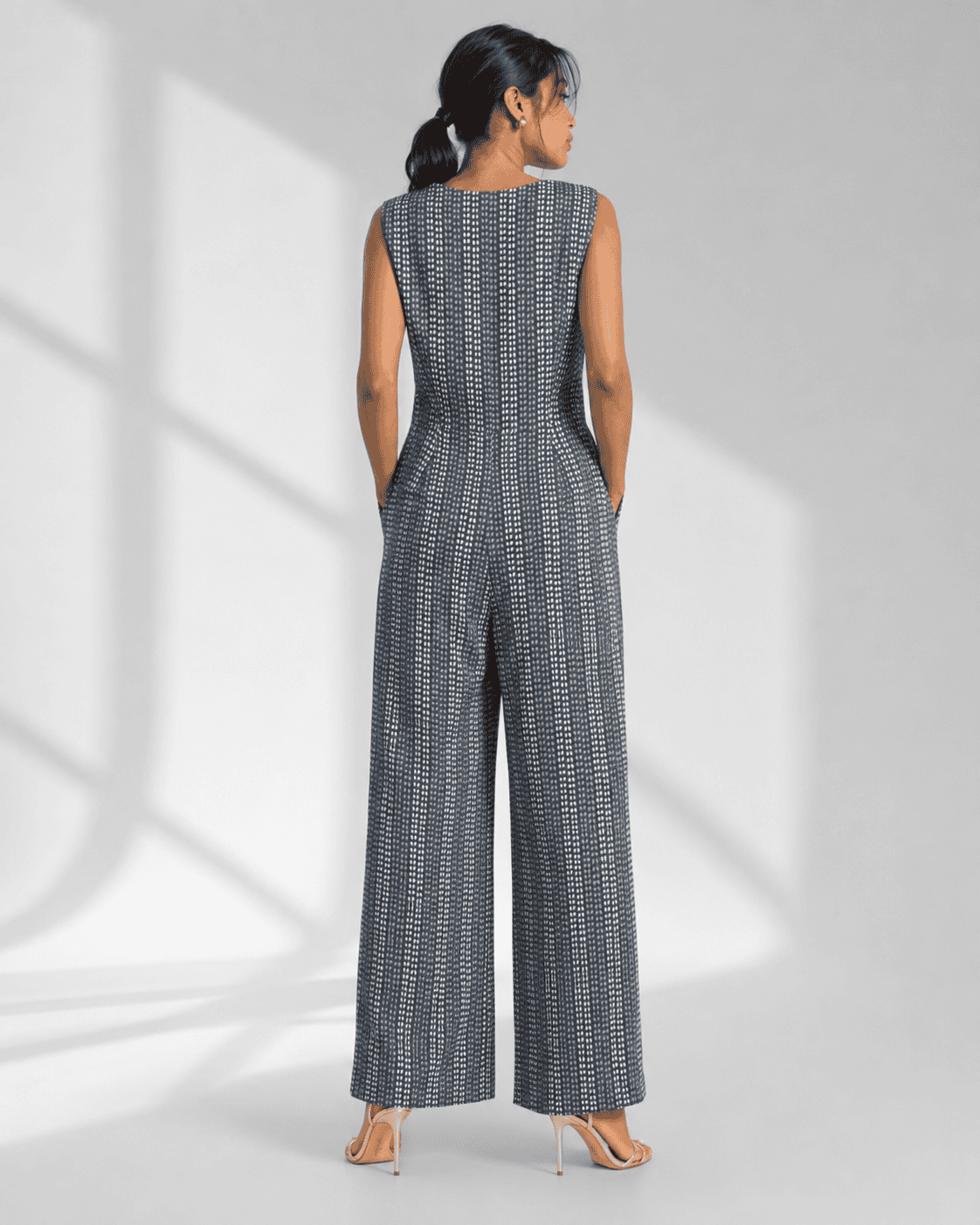 AVENZA grey teardrop print jumpsuit with side pockets by Neha Sharma Label