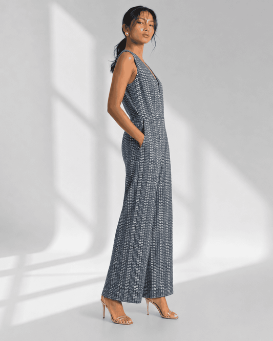 AVENZA grey cotton jumpsuit with V neck and concealed front opening by Neha Sharma Label