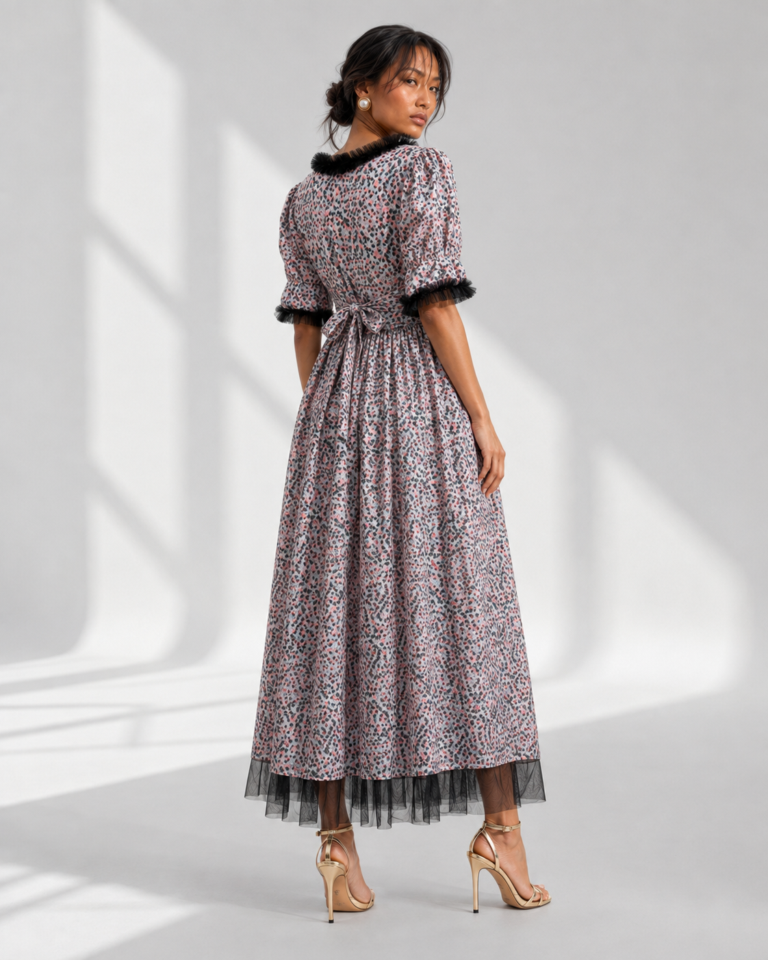 Back view of the MELUSINE tulle trim maxi dress showing the tie at the back waist.