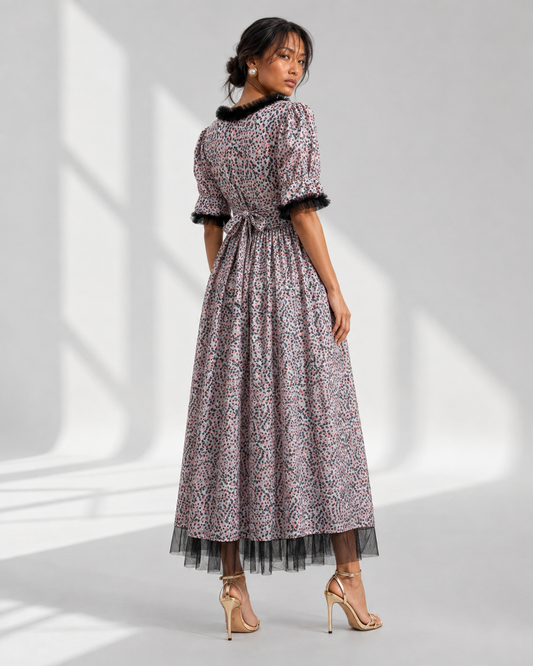 Back view of the MELUSINE tulle trim maxi dress showing the tie at the back waist.