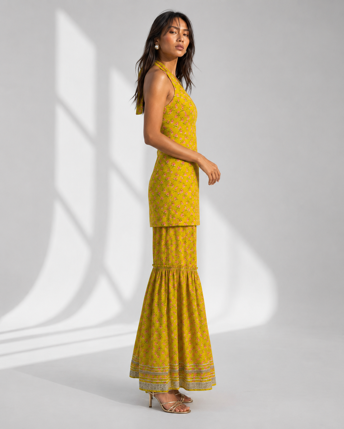 AVIRA mustard cotton gharara fitted through the hip with knee gather and floor flare by Neha Sharma Label