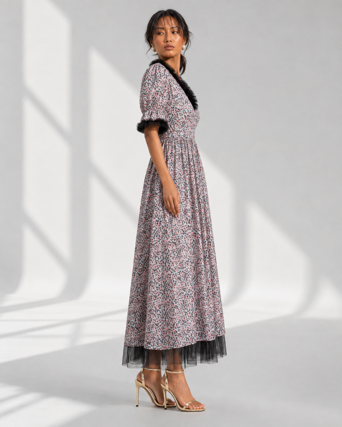 MELUSINE grey pink speckle maxi dress in profile with tulle frill cuffs and hem.