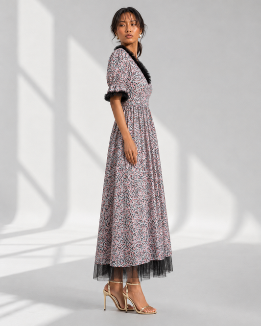 MELUSINE grey pink speckle maxi dress in profile with tulle frill cuffs and hem.
