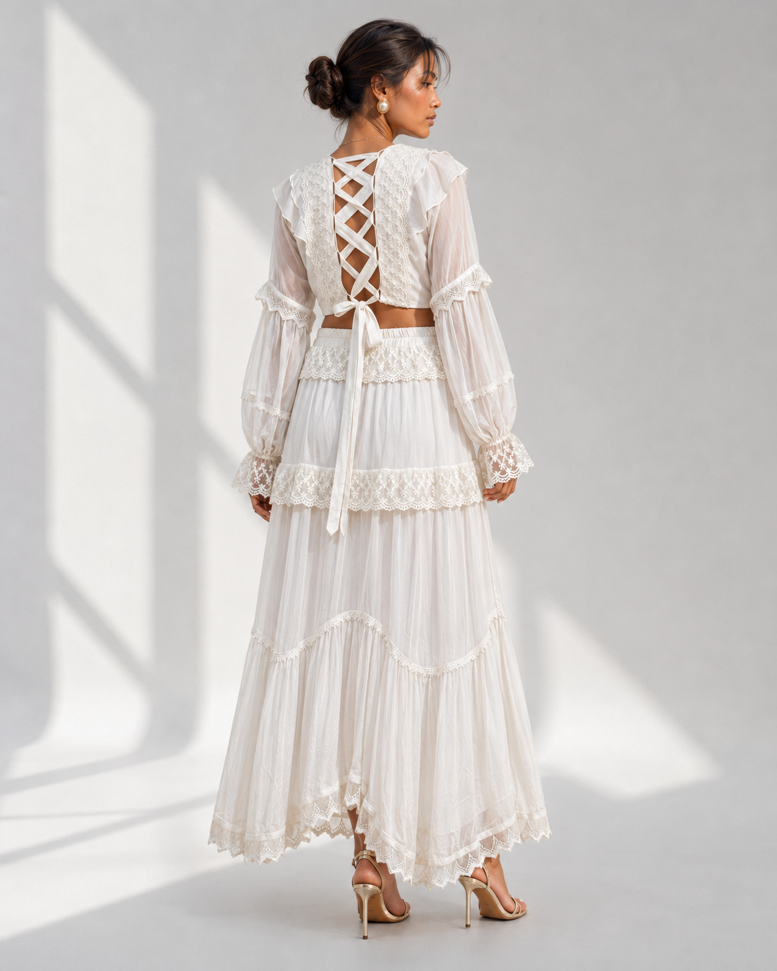 Back view of the MORWENNA ivory co-ord showing the criss-cross lace-up back and tie.