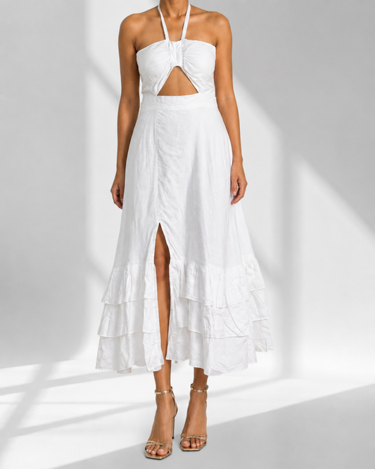 Close view of the knotted bust, keyhole cutout and slit on the MAREVA white maxi dress.