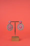 Pink circular beaded earrings