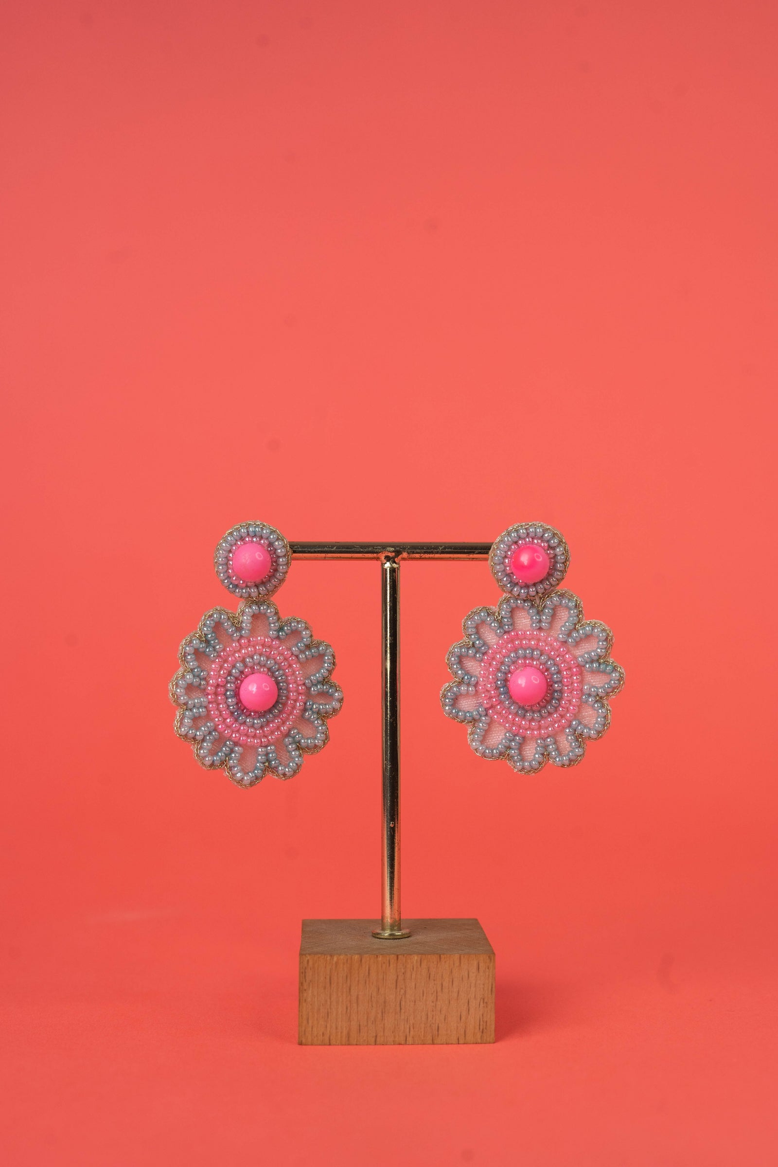 Pink circular beaded earrings