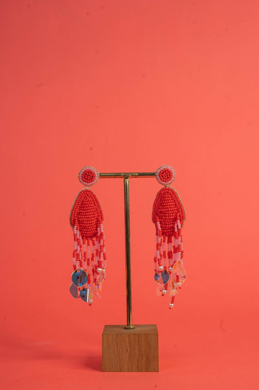 Red handcrafted beaded earrings with tassel drop
